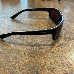 Men’s Maui Jim. Kanaio Coast Black Polarized Sunglasses with Bronze lenses.